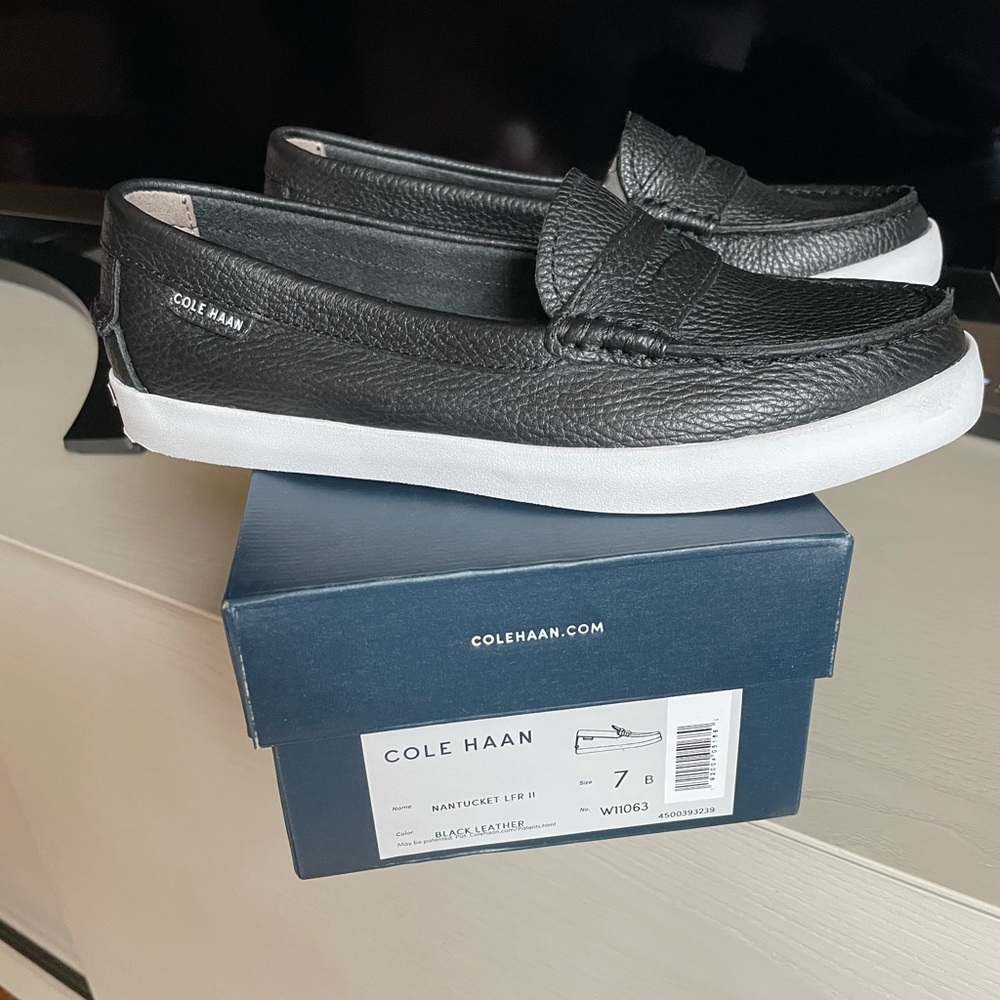 Brand new, never worn Cole Haan Nantucket loafer. Black leather. Size 7.